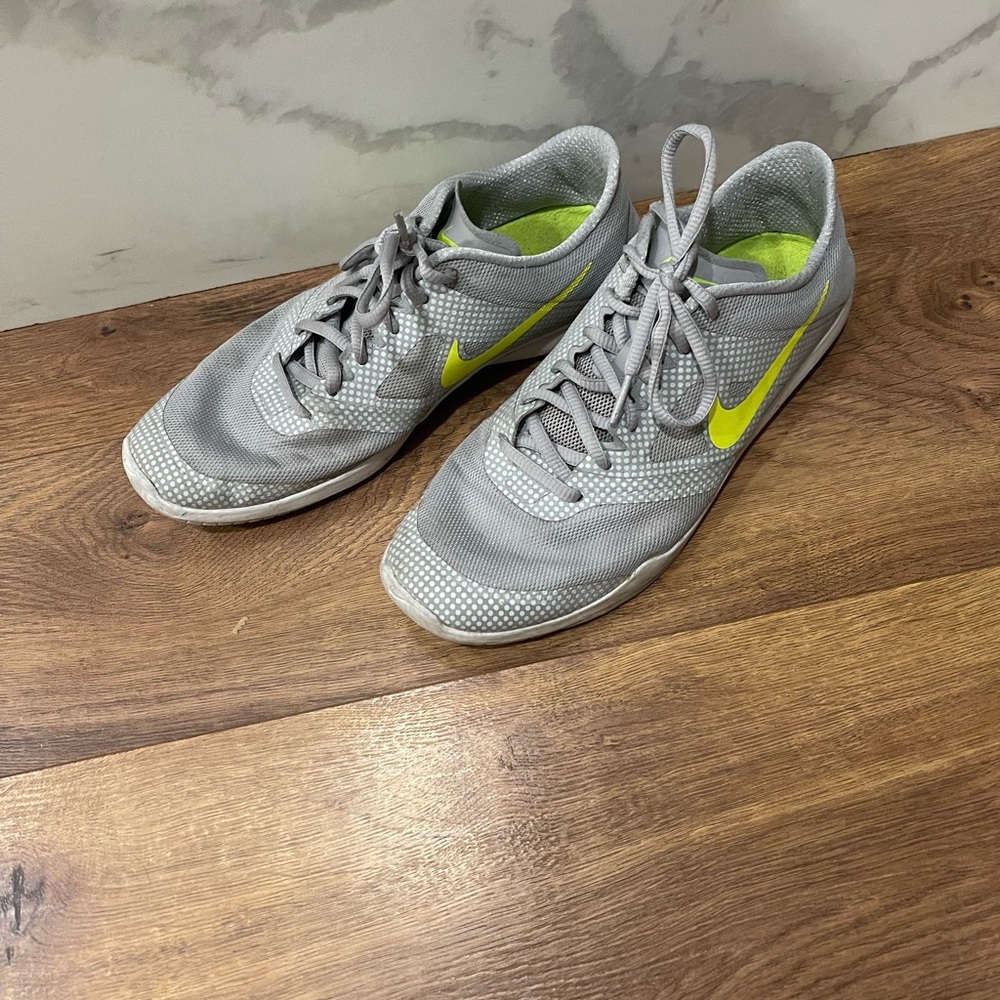 Grey and neon green Nike sneakers